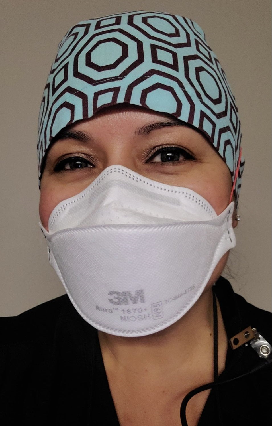 3M N95 1870 respirator mask worn by woman dental healthcare worker