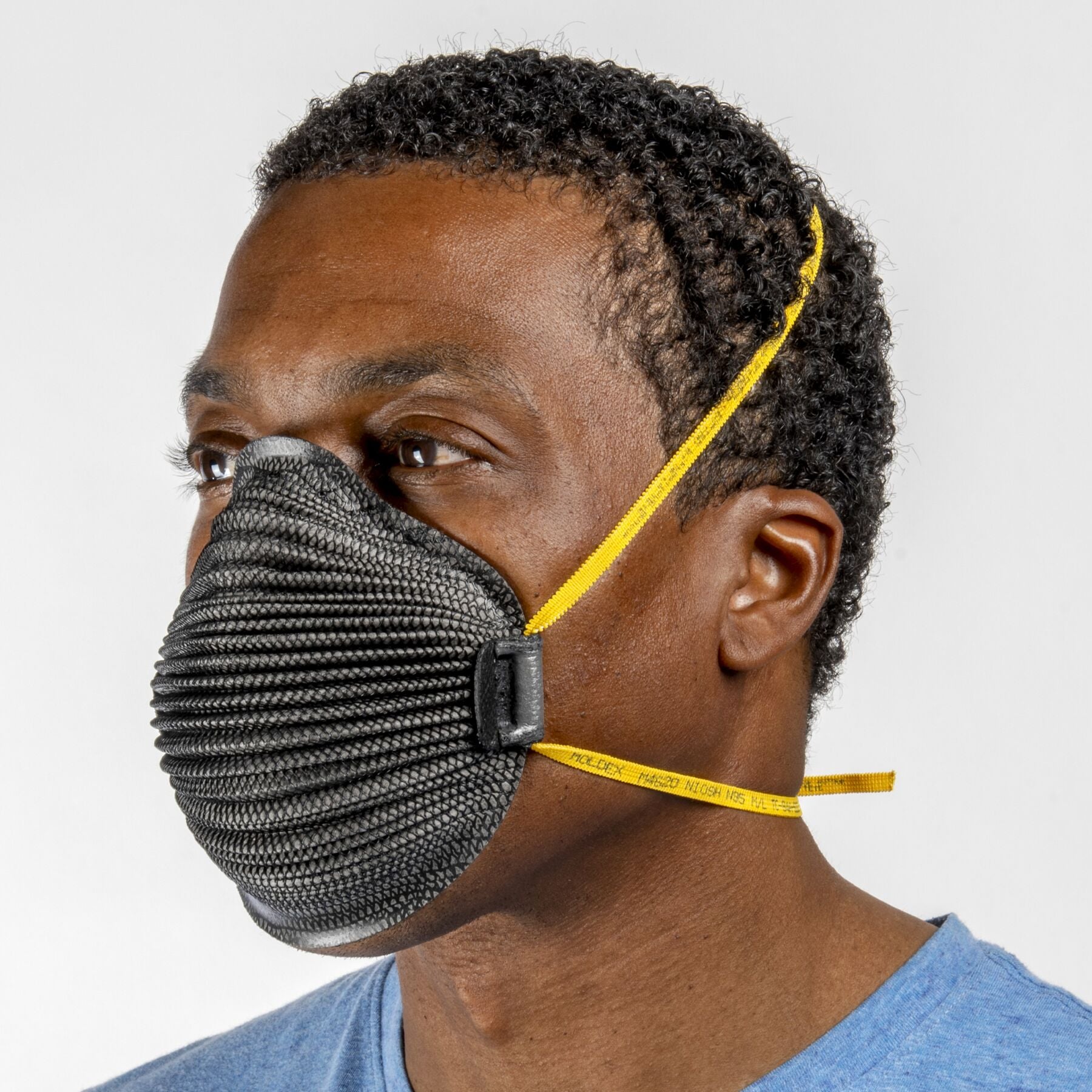 Man wearing medium large black Airwave M4620 NIOSH N95 respirator mask from Canada Strong Masks.