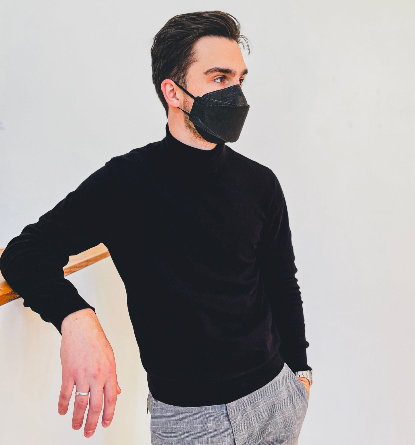 man wearing medium black KN95 respirator mask from canada strong masks
