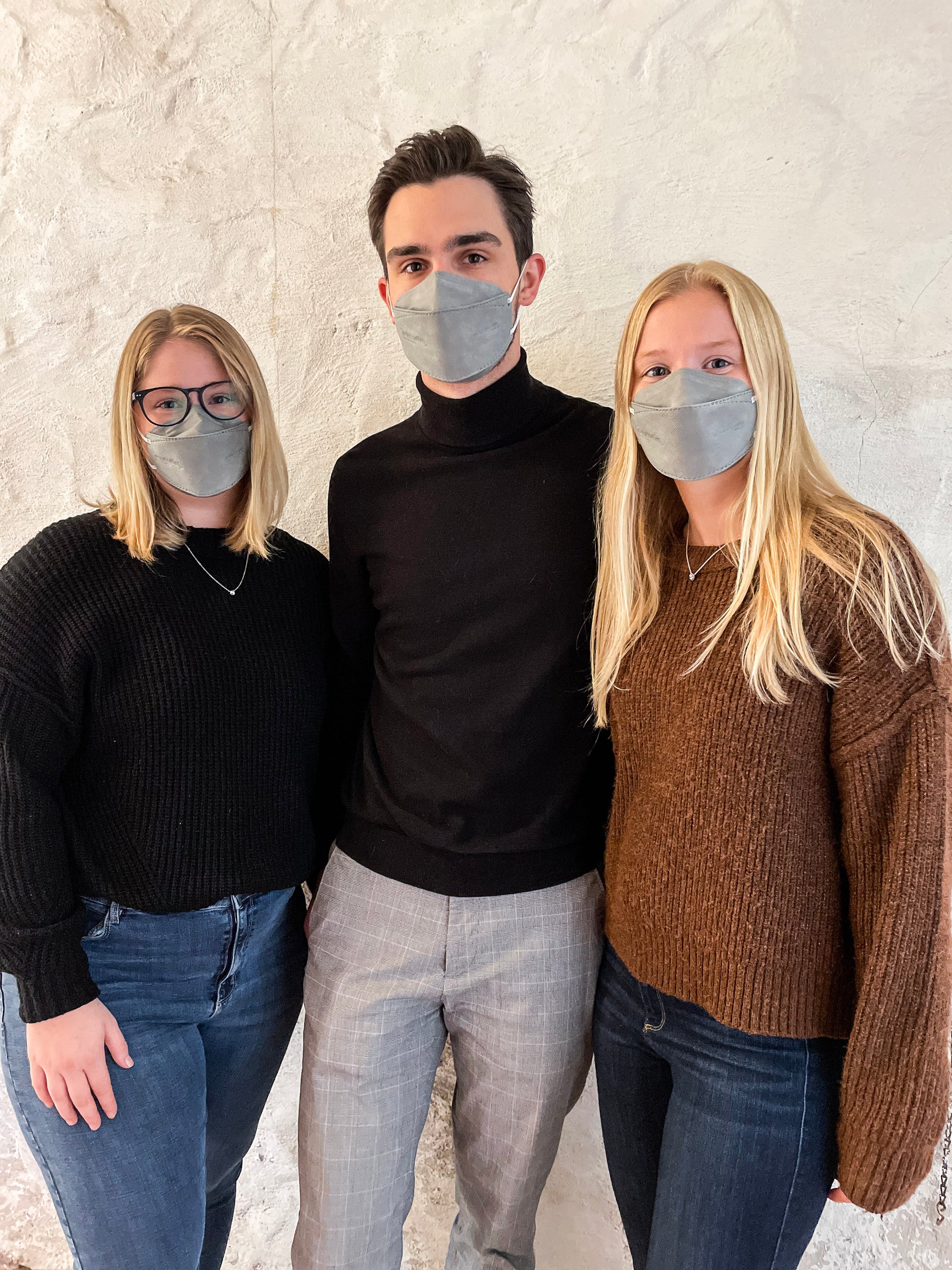 Young adults wearing grey Canadian breatheteq KN95 masks