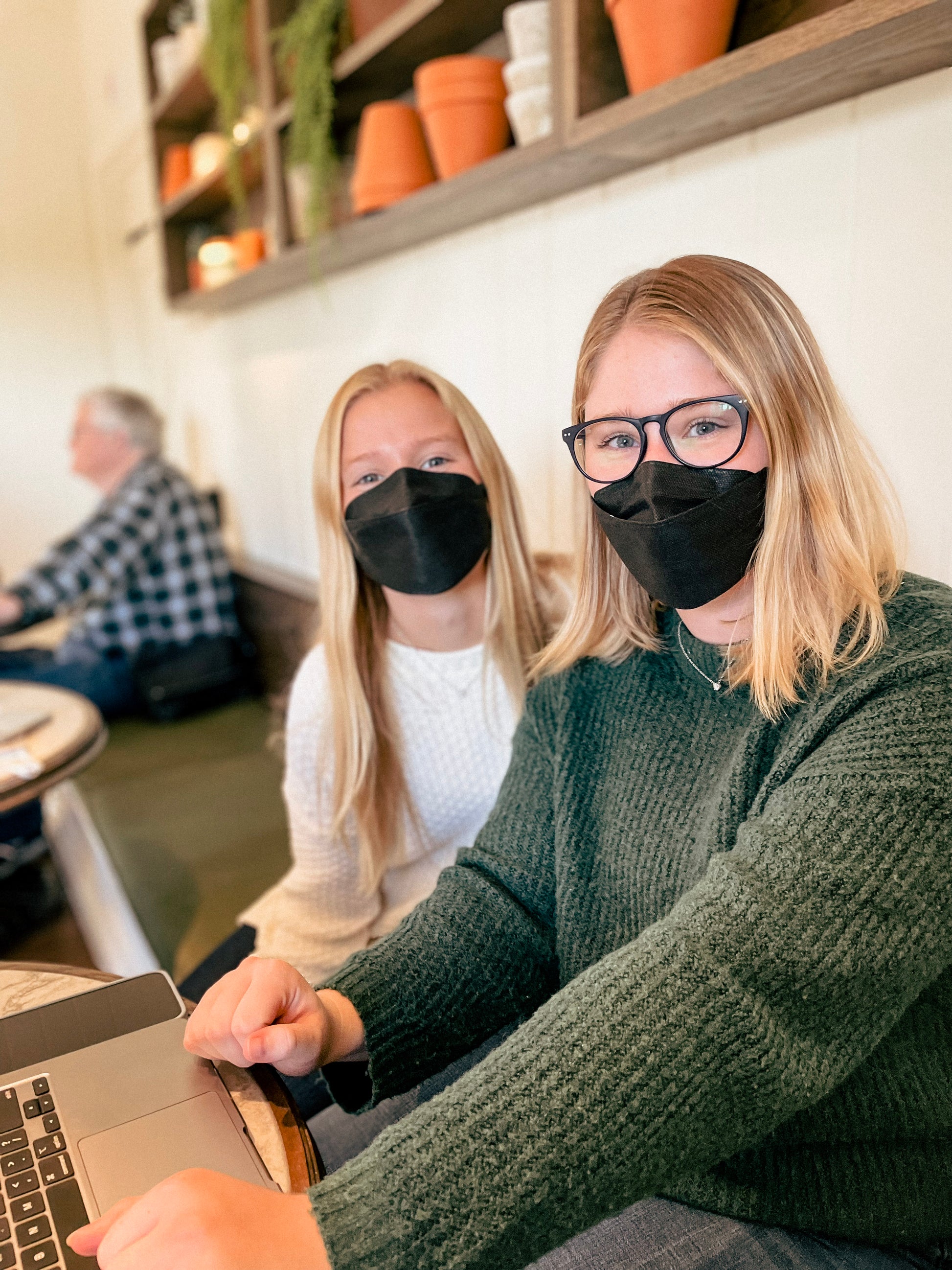 Women wearing black breatheTeq KN95 mask made in Canada