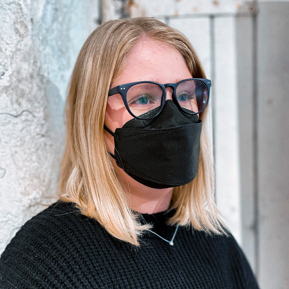 Woman young professional wearing BreatheTeq medium black Canada Masq KN95 respirator mask made in canada strong
